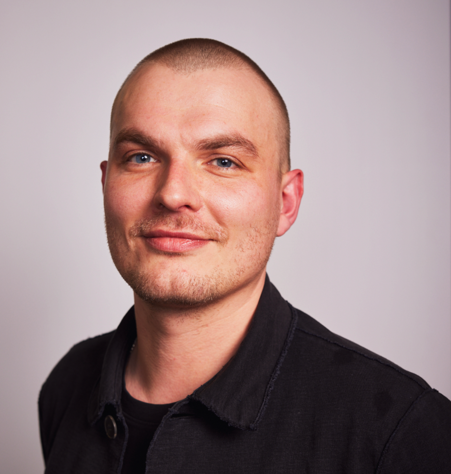 Headshot of Jake Johnson